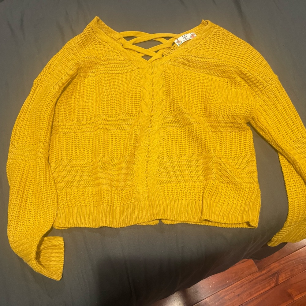 Yellow sweater type shirt